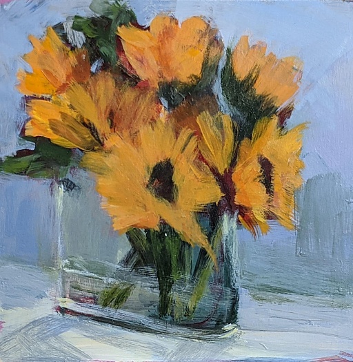 Sunflowers bouquet in glass vase